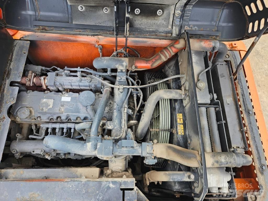 Doosan DX 210 W  휠 굴삭기
