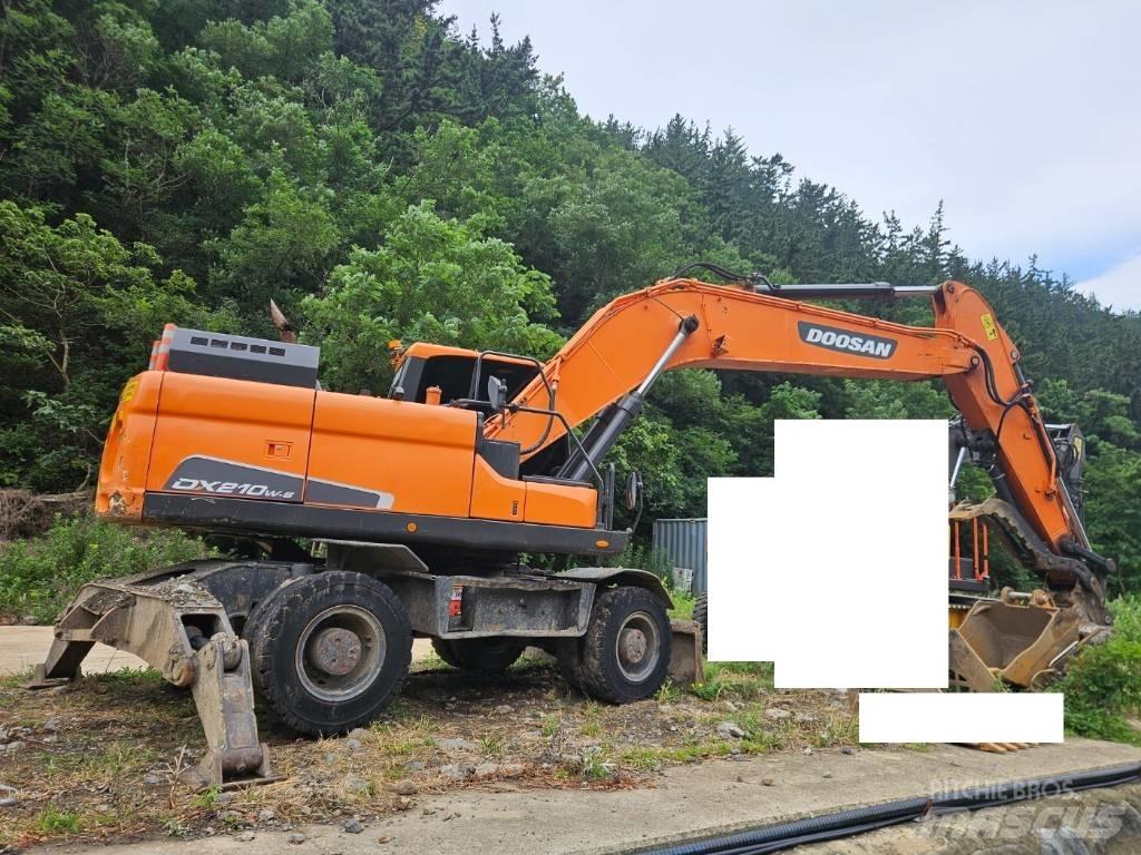 Doosan DX 210 W  휠 굴삭기