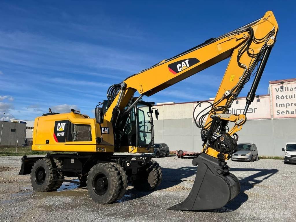 CAT M 318 F  휠 굴삭기