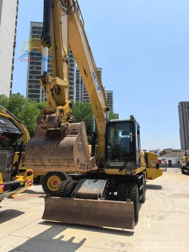 CAT M 315 D2  휠 굴삭기