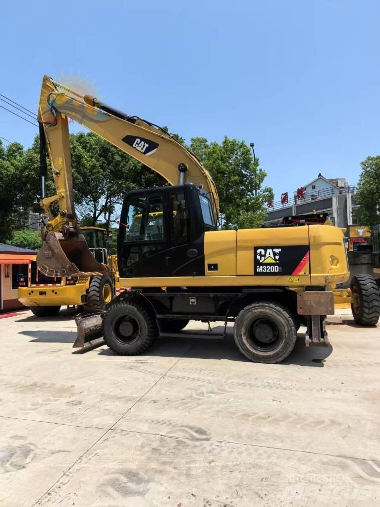 CAT M 315 D2  휠 굴삭기