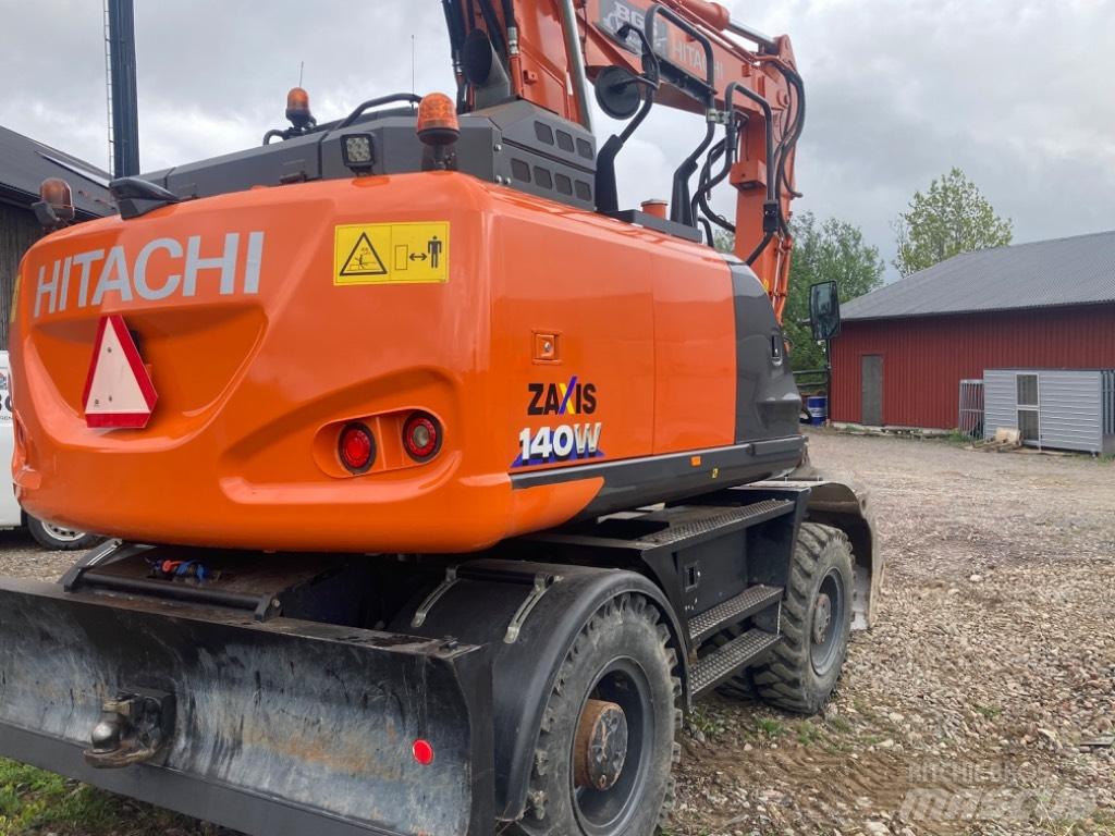 Hitachi 140w  휠 굴삭기