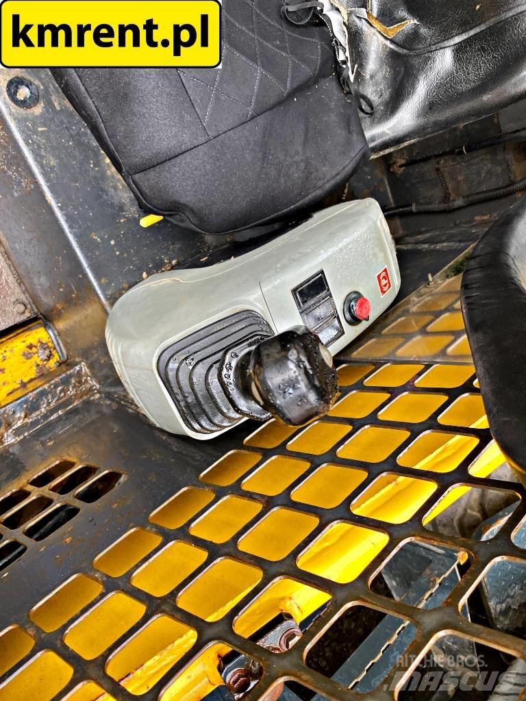 Komatsu SK 815  스키드로더