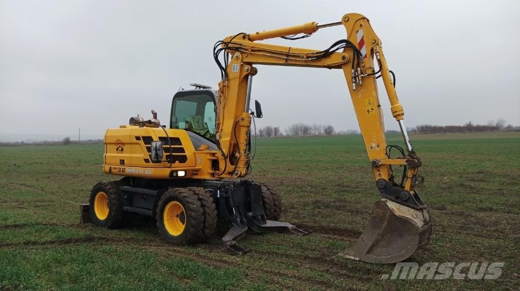 New Holland MH 3.6  휠 굴삭기