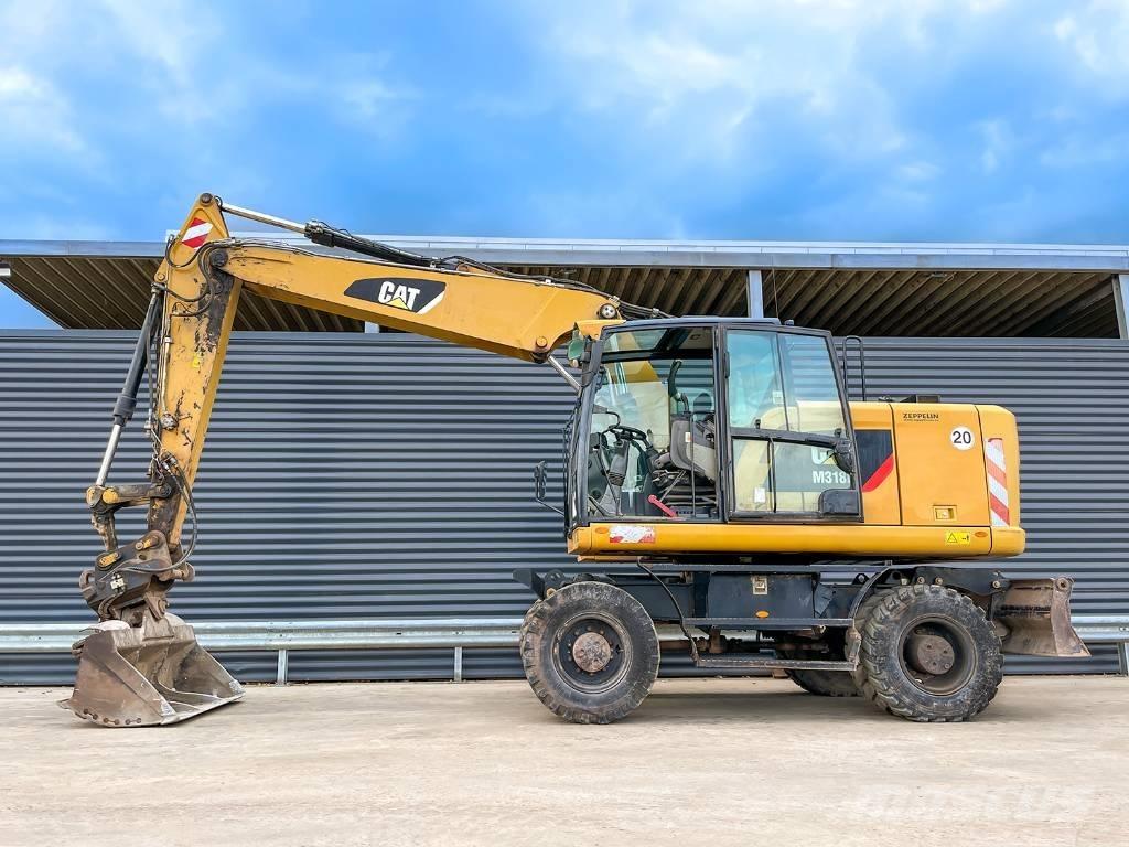 CAT M318F  휠 굴삭기