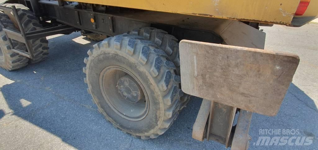 CAT 214 B  휠 굴삭기