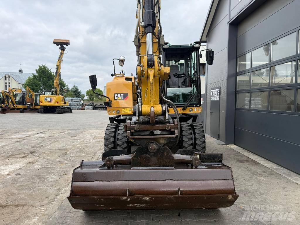 CAT M 318 F  휠 굴삭기