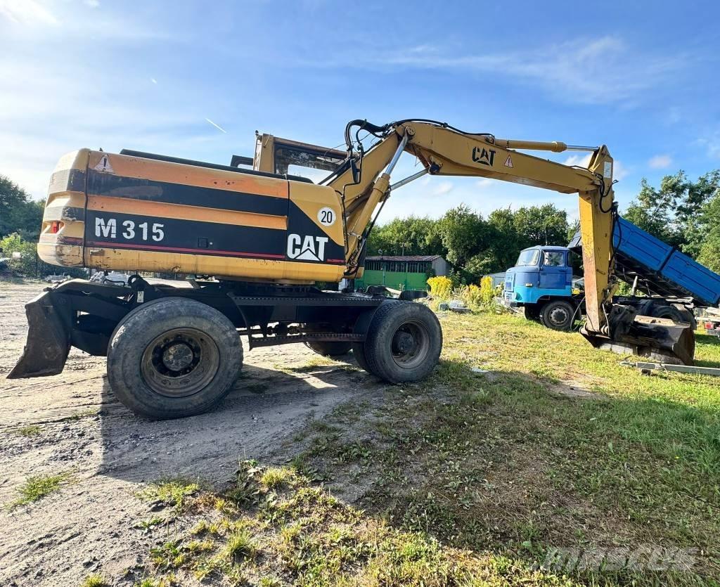 CAT M 315  휠 굴삭기