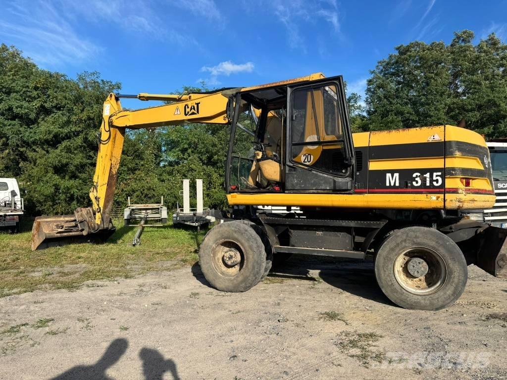CAT M 315  휠 굴삭기