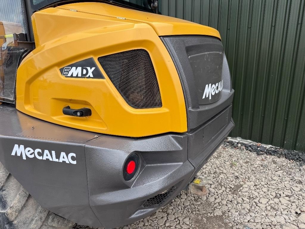 Mecalac 6 MDX 건설현장 덤프트럭