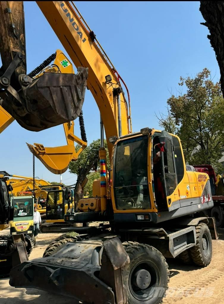 Hyundai 210W-9  휠 굴삭기