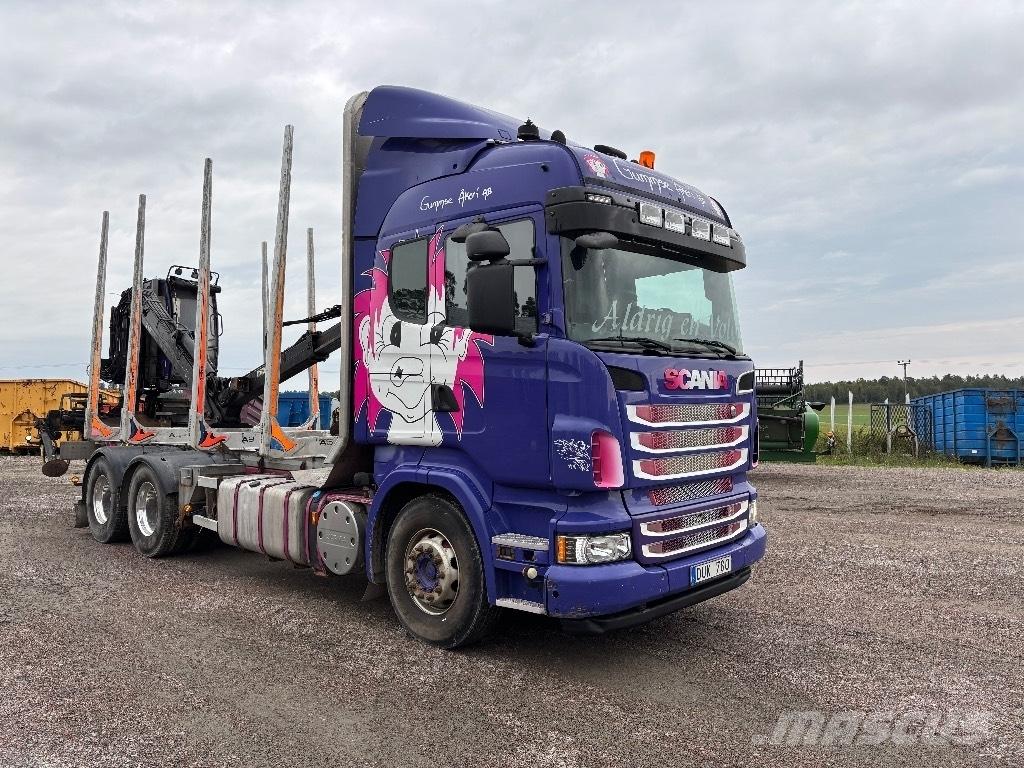Scania 560. 6x4 목재 트럭