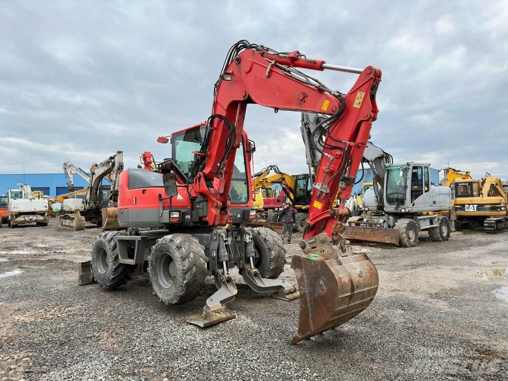Komatsu PW98MR-8  휠 굴삭기
