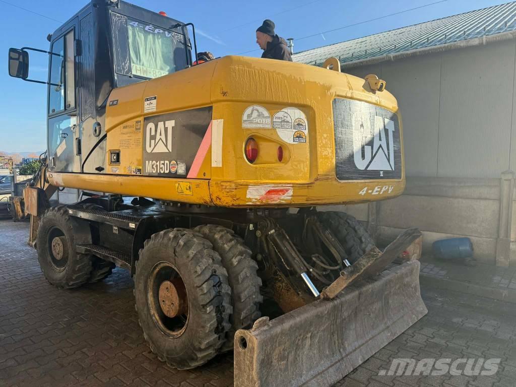 CAT M 315 D  휠 굴삭기