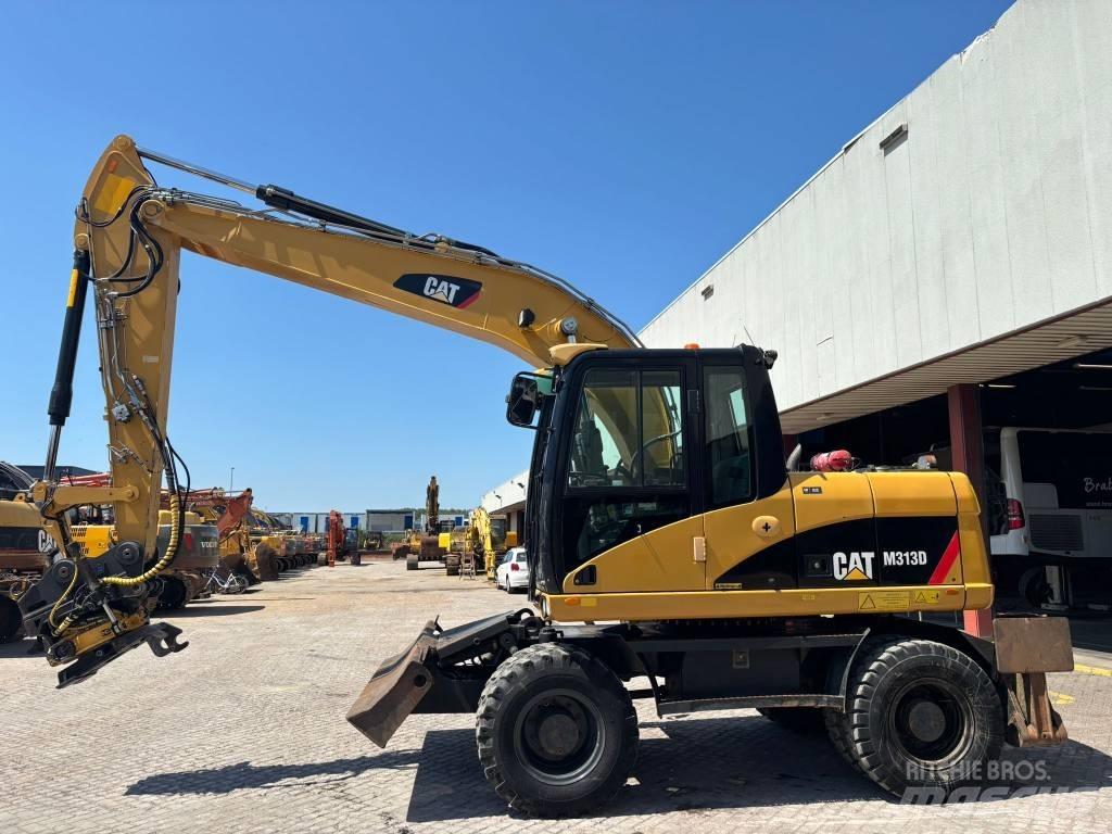 CAT M 313 D  휠 굴삭기