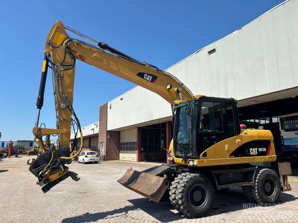 CAT M 313 D  휠 굴삭기