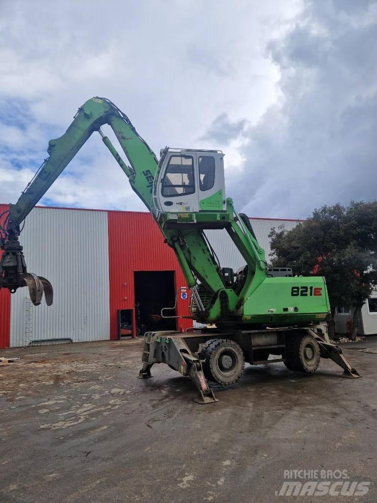 Sennebogen 821 E  휠 굴삭기