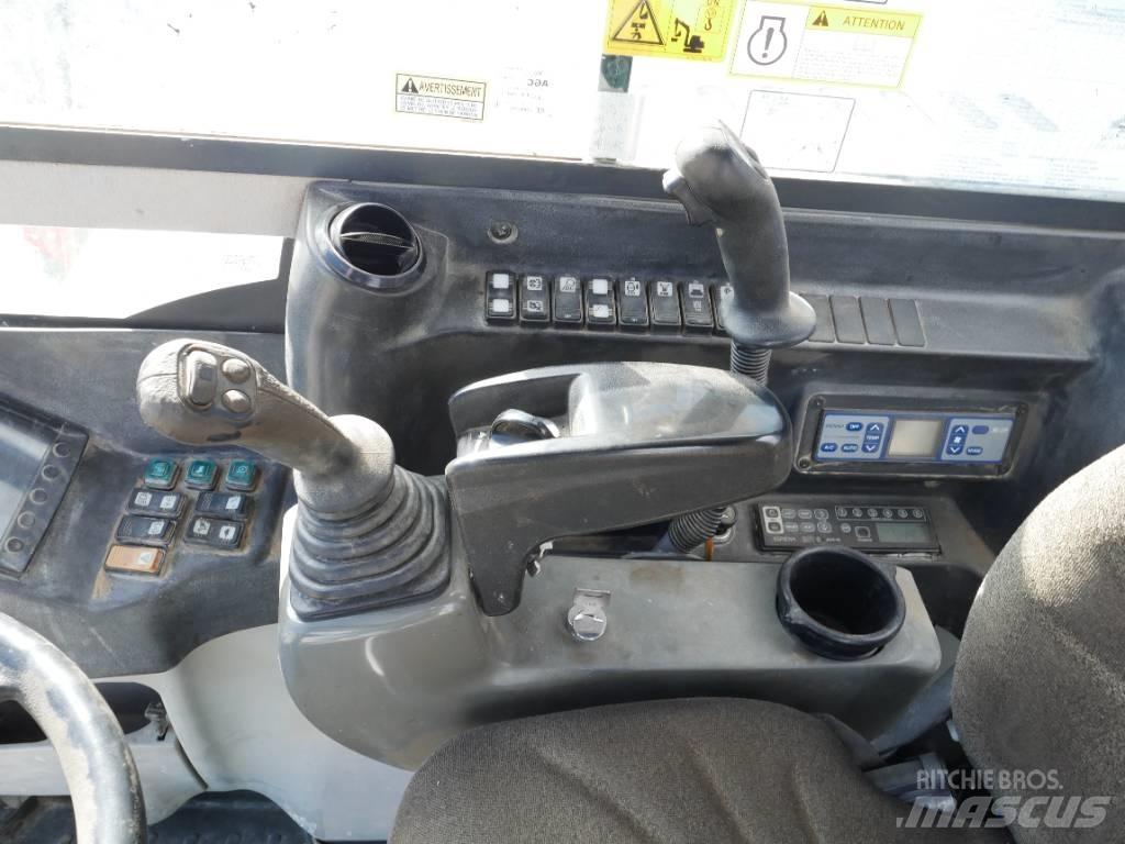 Takeuchi TB 295 W  휠 굴삭기