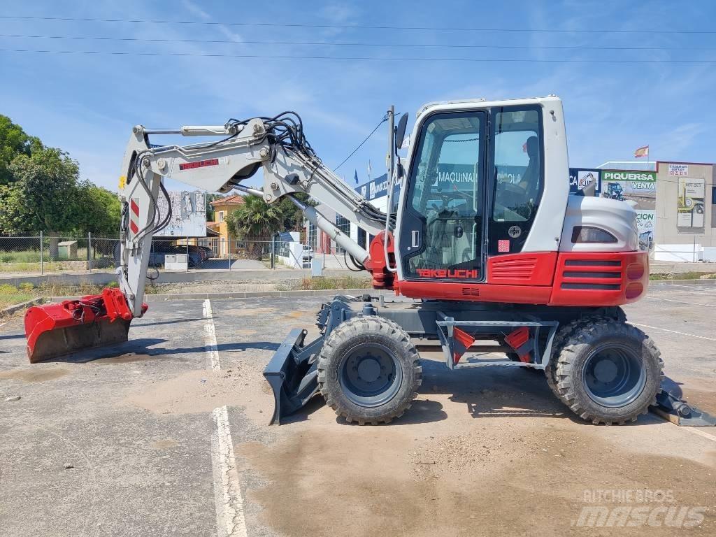 Takeuchi TB 295 W  휠 굴삭기