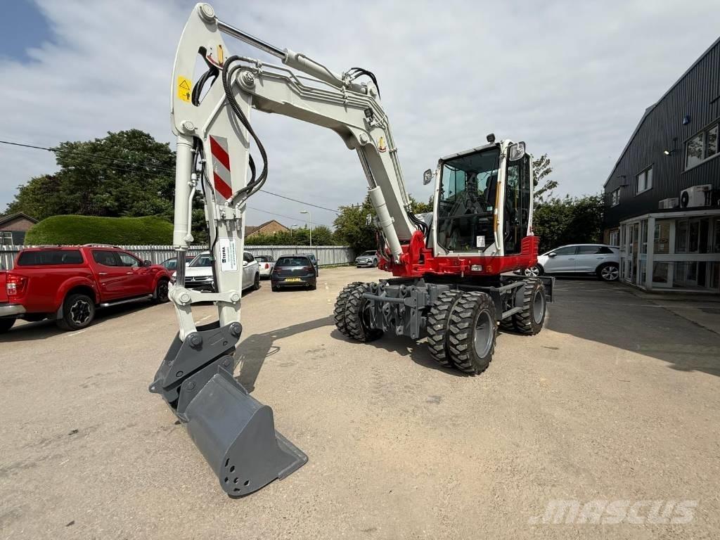 Takeuchi TB 295 W  휠 굴삭기
