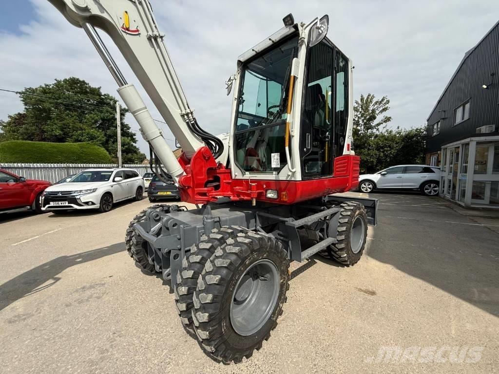 Takeuchi TB 295 W  휠 굴삭기
