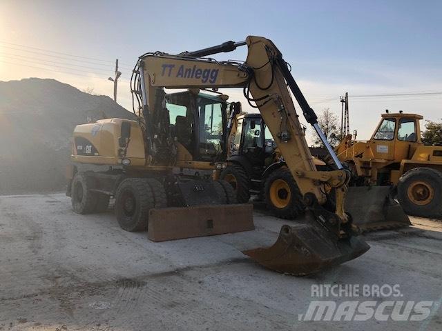CAT M 315 D  휠 굴삭기