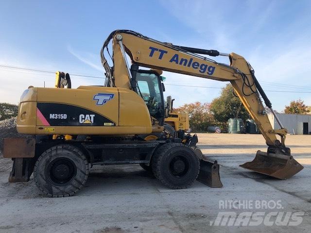 CAT M 315 D  휠 굴삭기