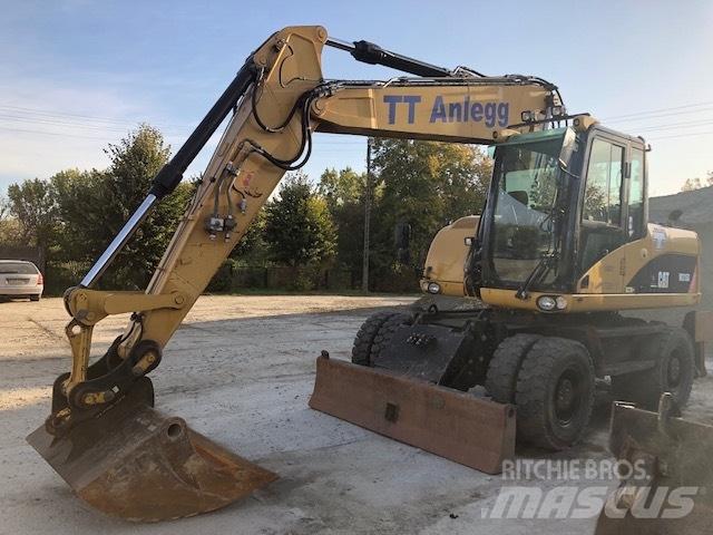 CAT M 315 D  휠 굴삭기
