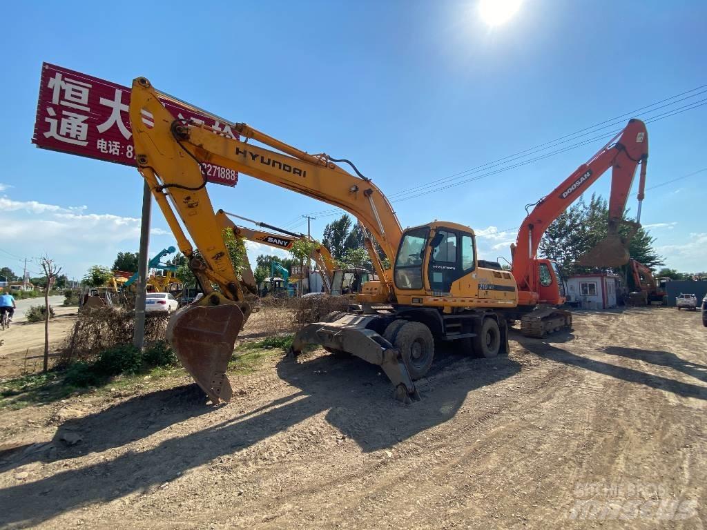 Hyundai 210w  휠 굴삭기