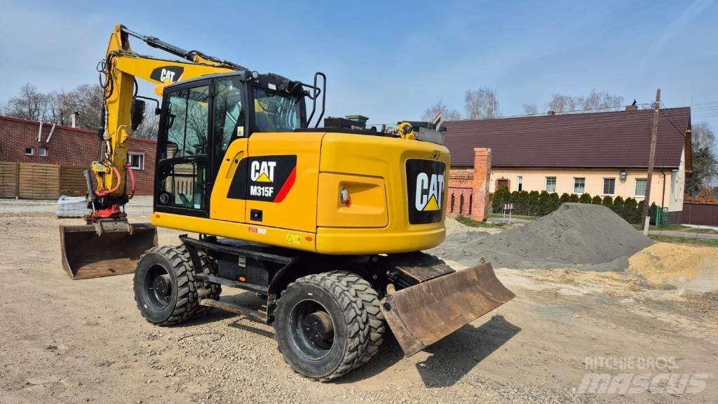 CAT M 315 F  휠 굴삭기