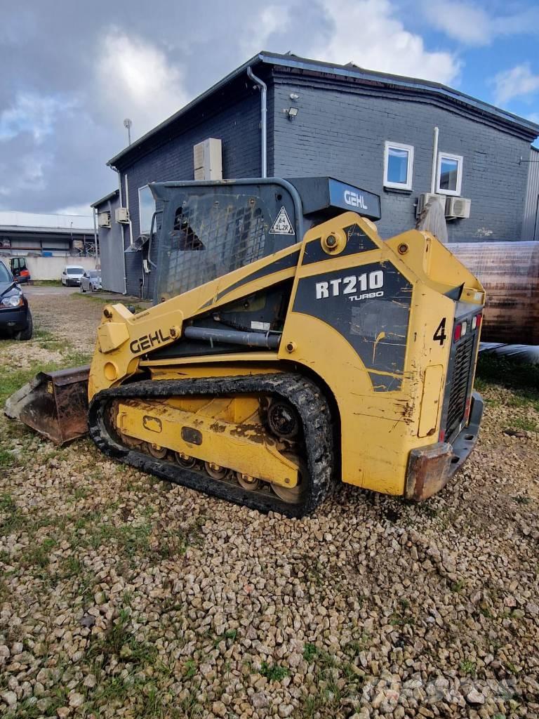 Gehl RT 210 궤도식 로우더