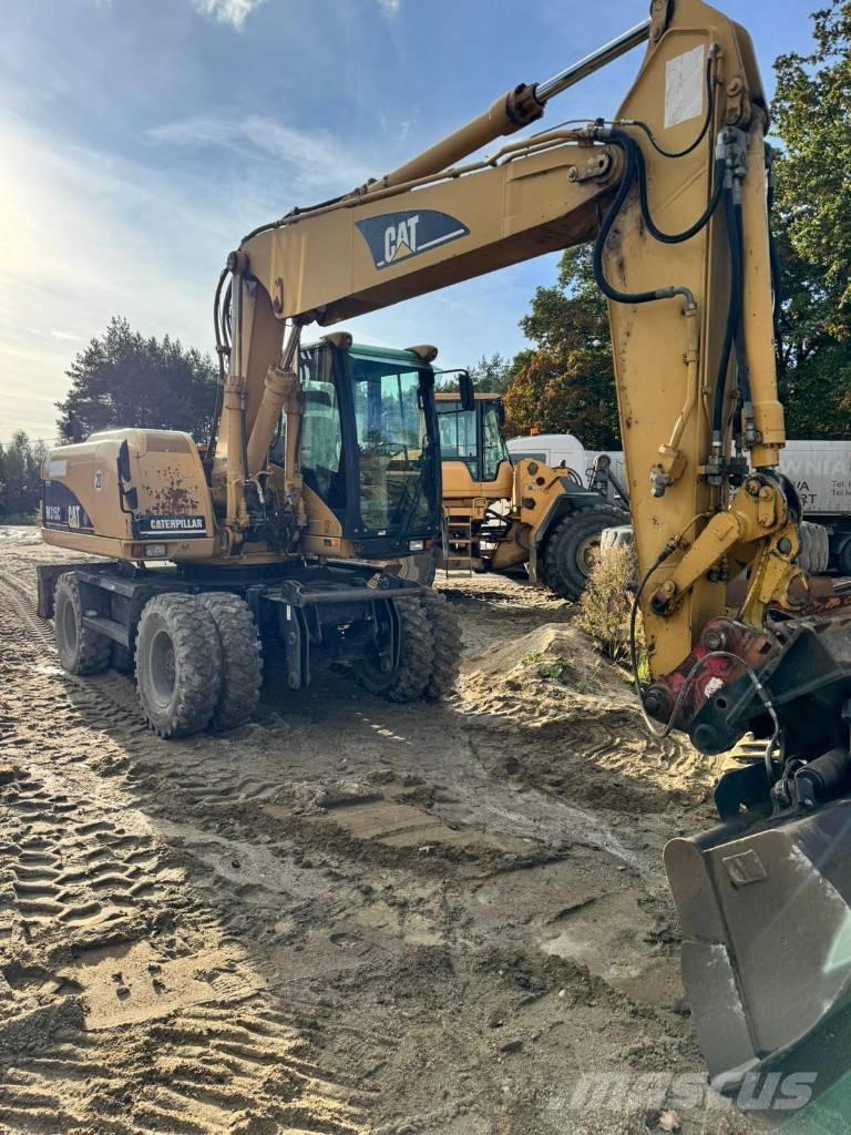 CAT M 315 C  휠 굴삭기