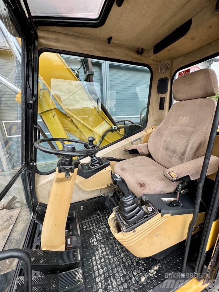 CAT M 315  휠 굴삭기
