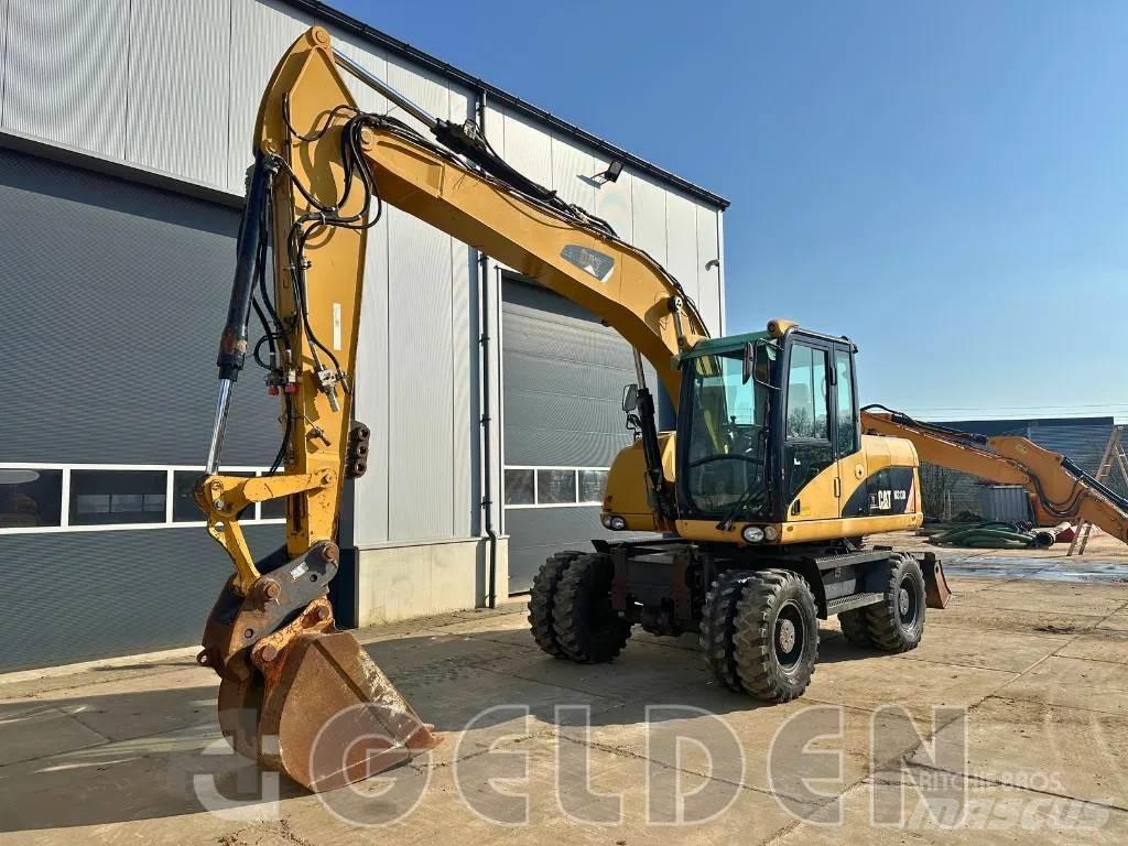 CAT M313D  휠 굴삭기