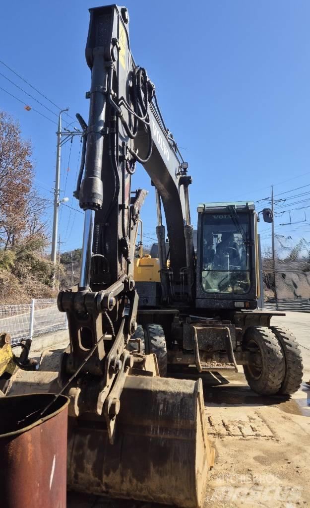 Volvo EW 140E  휠 굴삭기