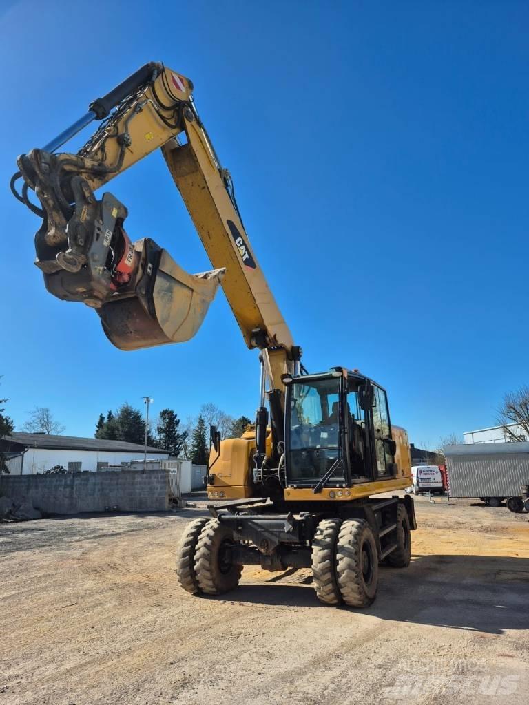 CAT M322F  휠 굴삭기
