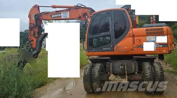 Doosan DX 140 W  휠 굴삭기