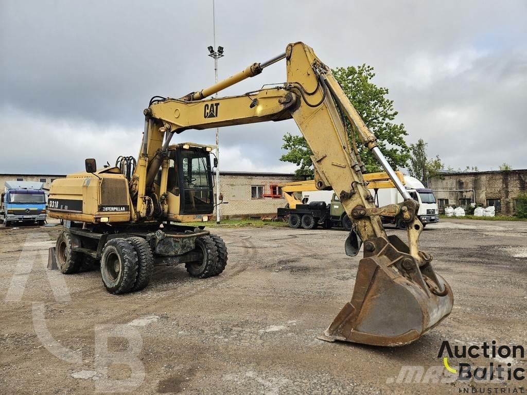 CAT M 318 C  휠 굴삭기