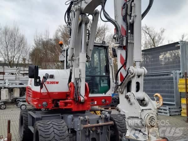 Takeuchi TB 395 W  휠 굴삭기