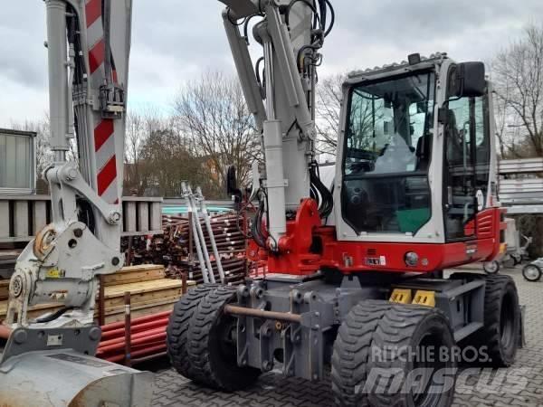 Takeuchi TB 395 W  휠 굴삭기