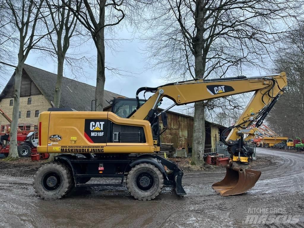 CAT M 318 F  휠 굴삭기