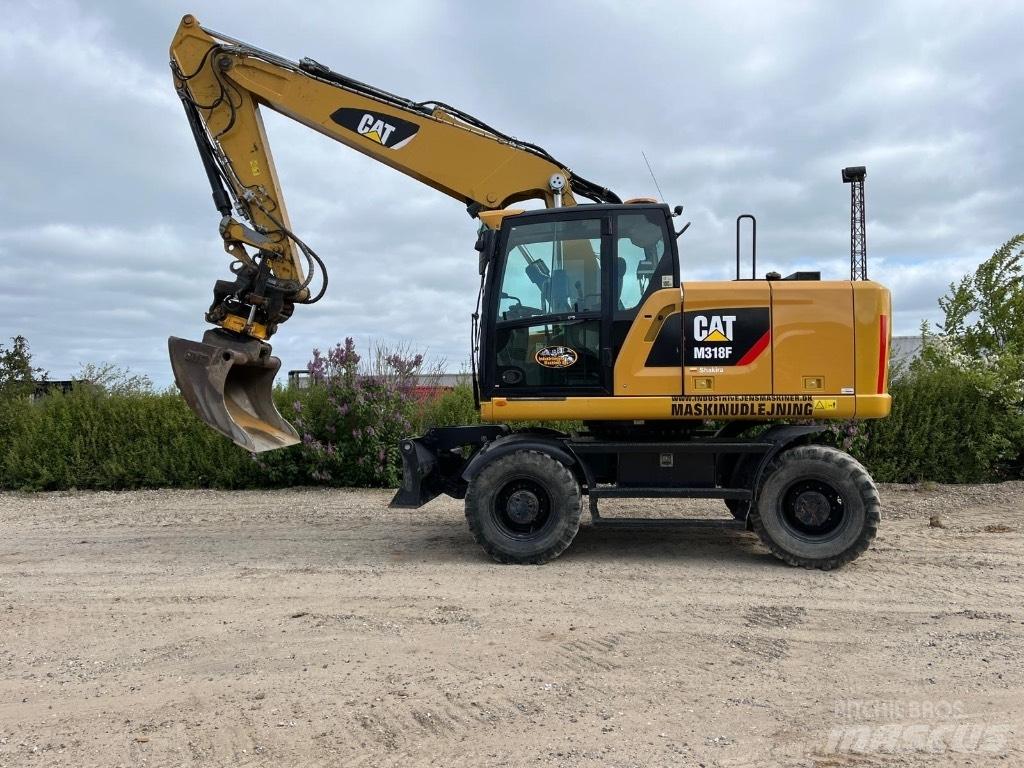 CAT M 318 F  휠 굴삭기