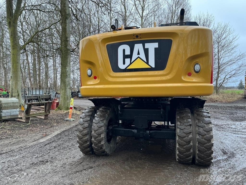 CAT M 318 F  휠 굴삭기