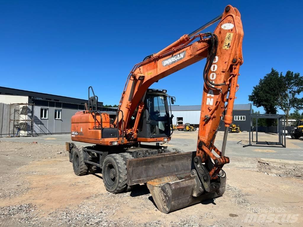 Doosan DX 140 W  휠 굴삭기