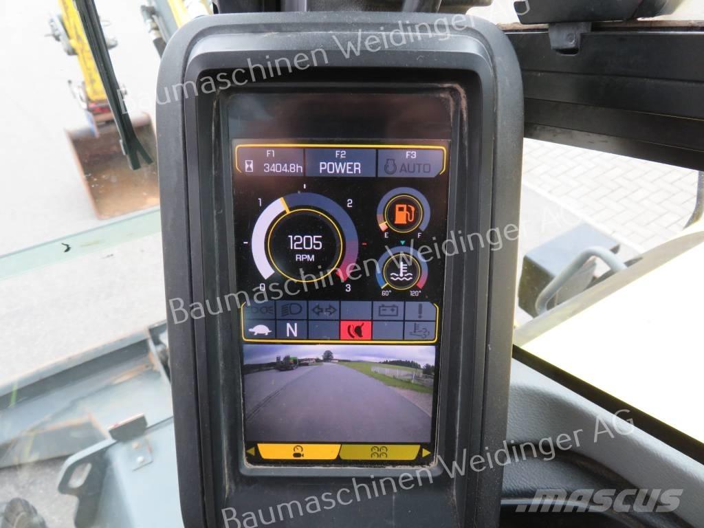 Neuson EW 65  휠 굴삭기