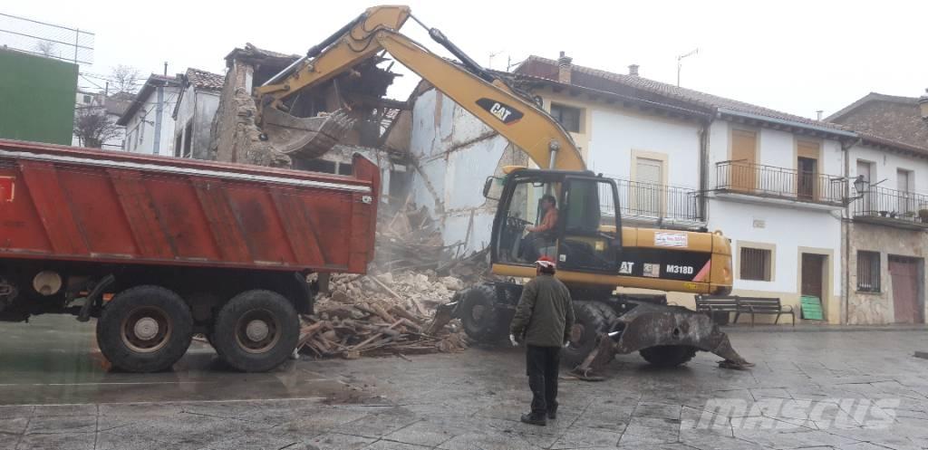 CAT M318d  휠 굴삭기