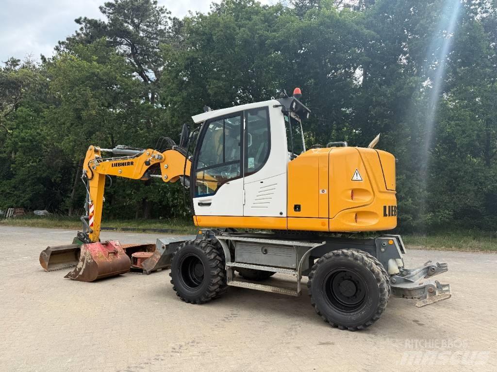 Liebherr A 910 Comp  휠 굴삭기
