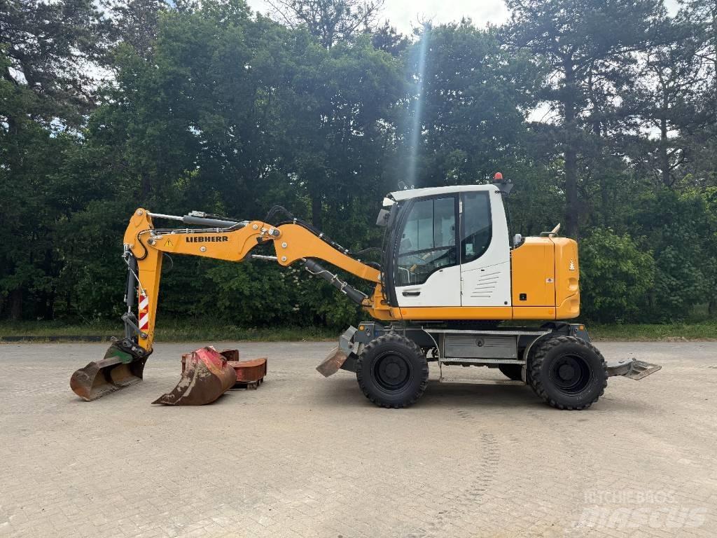 Liebherr A 910 Comp  휠 굴삭기