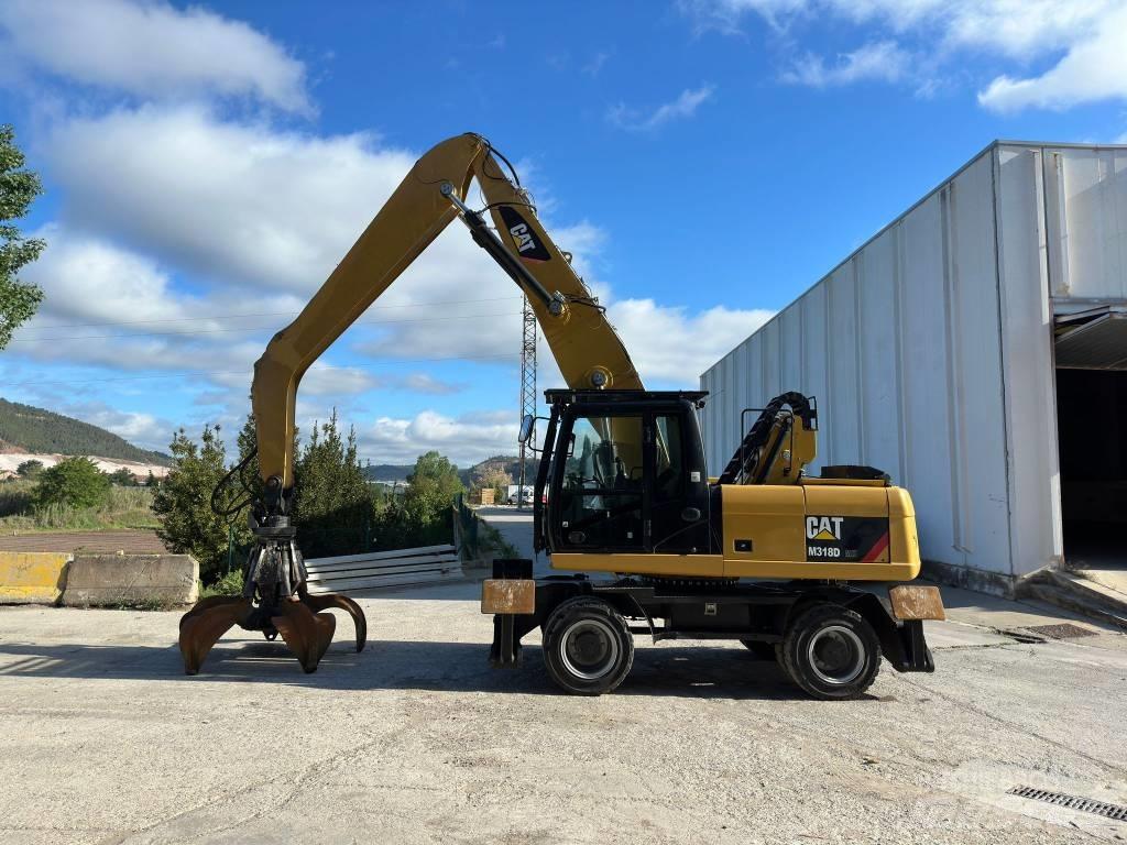 CAT M 318 MH  휠 굴삭기