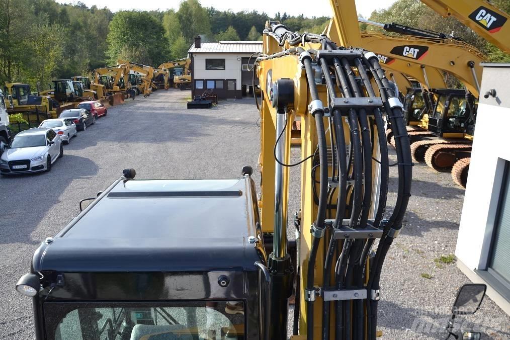 CAT M 315 D  휠 굴삭기